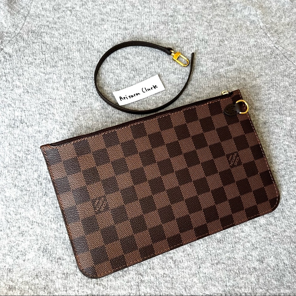 Sold Louis Vuitton Damier Neverfull MM wristlet pouchette